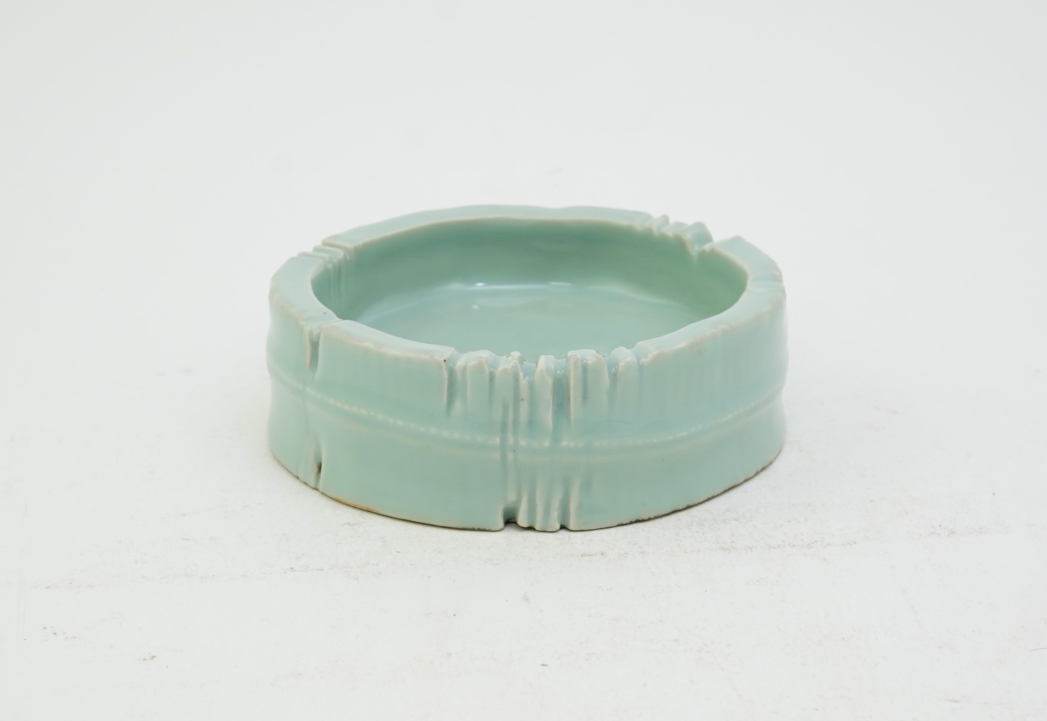 A Chinese celadon glazed brushwasher, Qianlong mark but later
